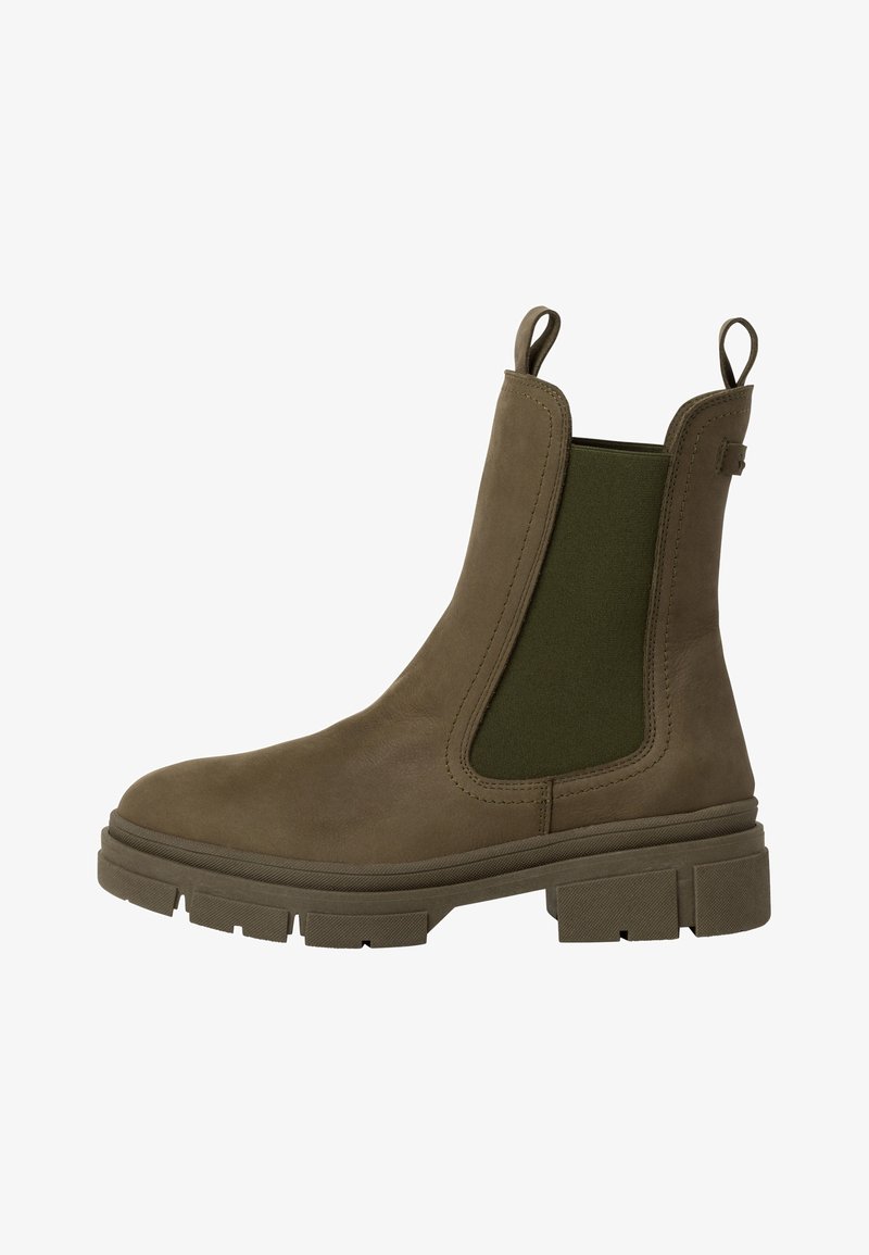 Botte cheville en suede marron avec panneau latéral élastique vert, languette, semelle épaisse et semelle texturée pour une meilleure adhérence.