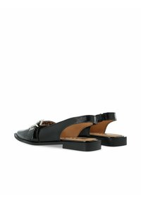 Black patent leather slingback shoes with a low block heel, featuring a decorative metal buckle and a smooth finish. Open back design.
