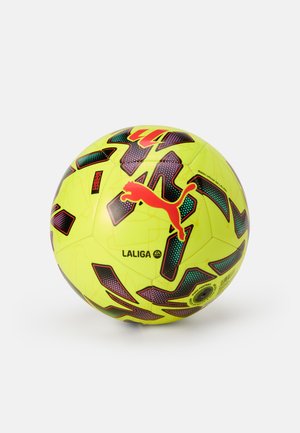 Heled kollane jalgpall mustade ja lillade geomeetriliste mustritega, millel on punane Puma logo ja tekst "La Liga". Tekstuuritud pind haarde tagamiseks.