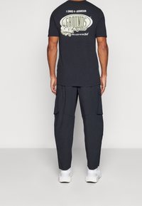 Under Armour Friluftsbyxor - black