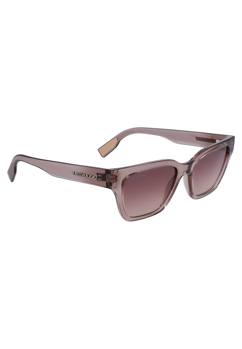 Sonnenbrille mit einem transparenten mauve Rahmen, quadratischer Form, Verlaufsgläsern und goldenen Akzenten an den Bügeln. Markenlogo an der Seite sichtbar.