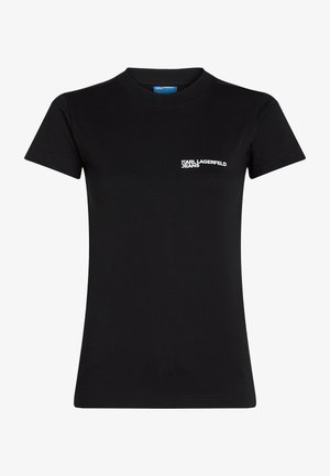 Must must t-särk, millel on ümar kaelus ja lühikesed varrukad, ülemises vasakus rinnapiirkonnas valge "KARL LAGERFELD JEANS" brändimine.