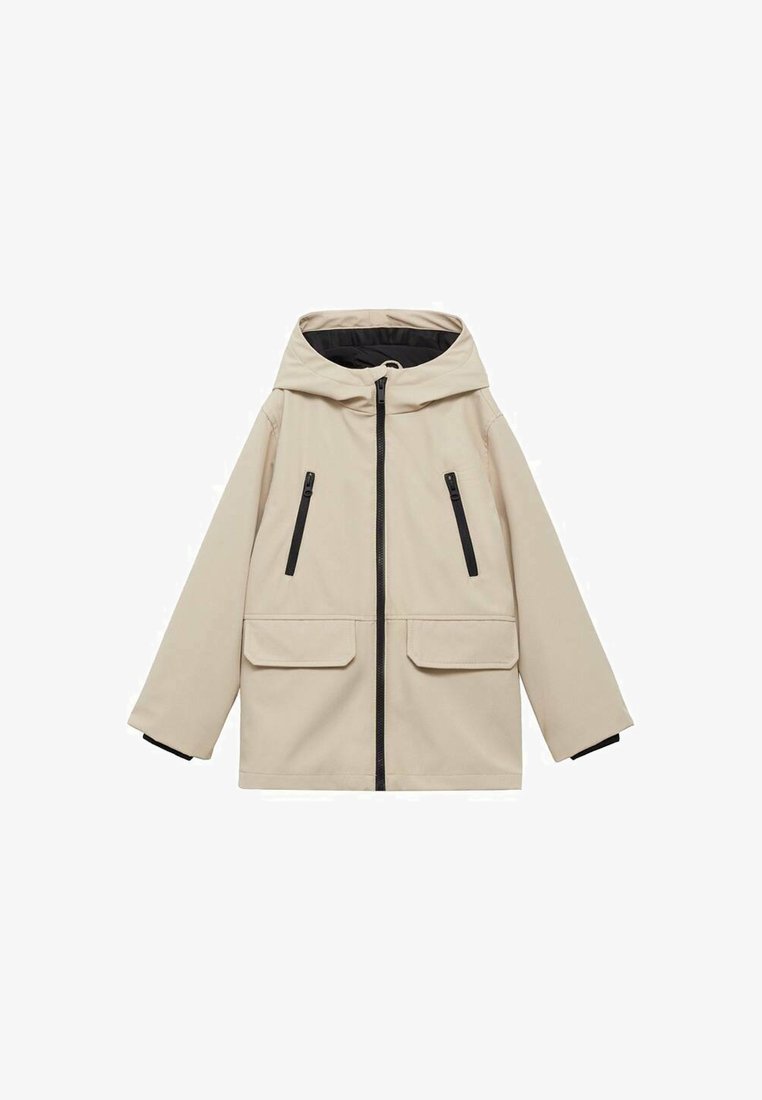 Bež jakna s kapuljačom, prednjim zipom, dva džepa na prsima i bočna džepa. Crni detalji na zipovima i manžetama. Glatka tekstura.