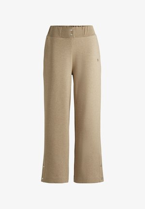 Pantaloni beige chiaro realizzati in morbido tessuto, con una vita larga a costine e dettagli con bottoni sul fondo per lunghezza regolabile.