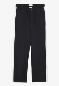 Zwarte joggingbroek met witte zijstrepen, elastische tailleband, trekkoord en een zachte textuur. Rechstrekkende pasvorm met minimale details.