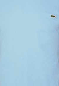 Lacoste Paprasti marškinėliai - light blue