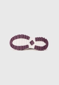 Shoe sole featuring a textured white base with deep purple rubber tread patterns and grooves for grip and traction.