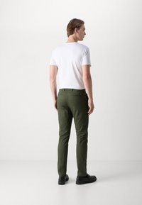 Calvin Klein MODERN SLIM - Chino hlače - dark olive