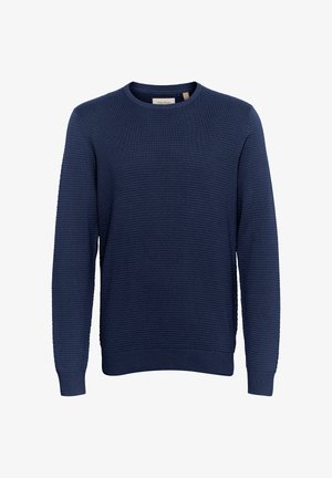 Granatowy sweter wykonany na drutach z teksturowanym wzorem, okrągłym dekoltem oraz ściągaczami przy mankietach i u dołu. Miękki, elastyczny materiał.