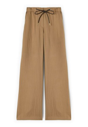 Beige wijde broek met elastische tailleband en zwart trekkoord met metalen uiteinden, gemaakt van lichtgewicht gestructureerde stof.