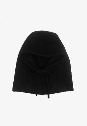 Knitted black hood with a textured finish. Features a tied drawstring at the front for adjustment, and a slouchy shape.
