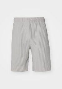 Pantalones cortos de tela acanalada de color gris claro con cinturilla elástica, de longitud hasta la rodilla, con una textura suave, mostrados sobre un fondo blanco.
