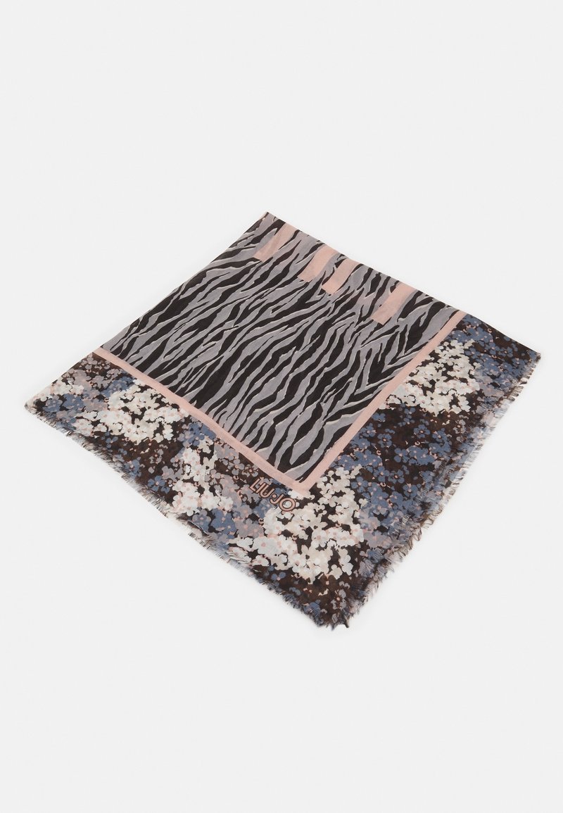 Foulard carré avec des rayures de zèbre au centre et des motifs floraux en bleu, blanc et marron le long des bords.