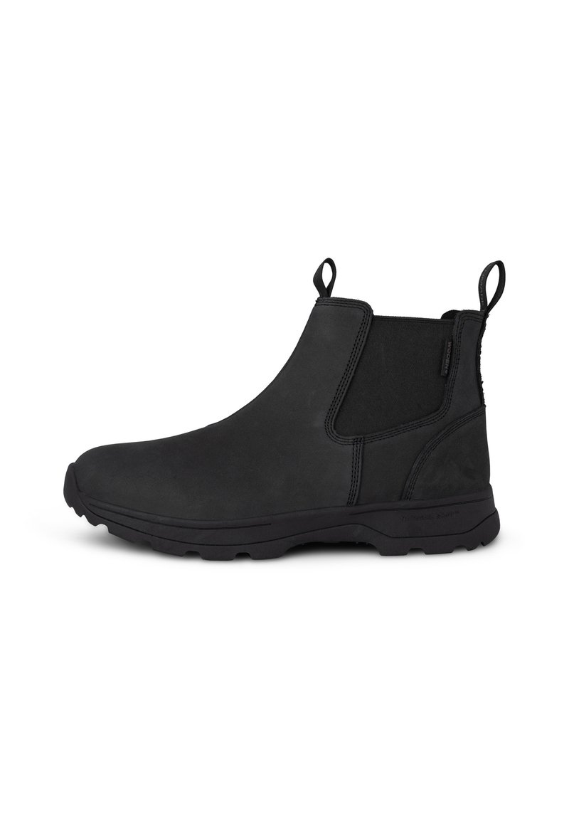 Botines negros de cuero liso con paneles laterales elásticos y tiradores, que presentan una suela de goma texturizada y una silueta elegante.