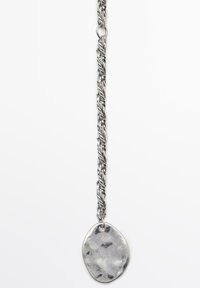 Silver-toned necklace featuring a twisted chain and an irregularly shaped pendant with a textured surface.