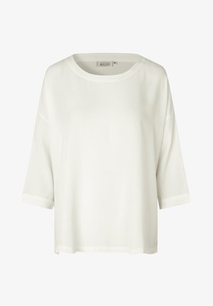 Biała, luźna bluzka z lekkiego materiału. Posiada okrągły dekolt, krótkie rękawy i prosty dół. Minimalistyczny design.