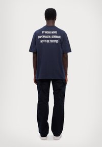 DOUBLE A BY W.W. NOT TO BE TRUSTED UNISEX - Print T-shirt - dark navy