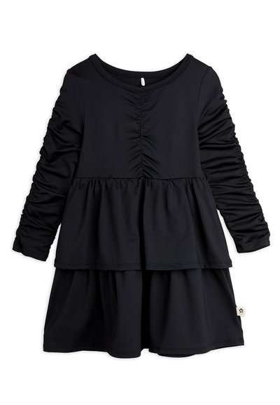 Μαύρο φόρεμα με μακριά μανίκια, με συγκεντρωμένες λεπτομέρειες, φαρδιά φούστα και στρογγυλή λαιμόκοψη. Φτιαγμέν�ο από μαλακό, ελαστικό υλικό.