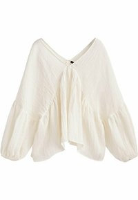 Blouse blanche légère avec un décolleté en V, des manches oversize et de doux plis. Tissu texturé, coupe décontractée et détail de fermeture au dos.