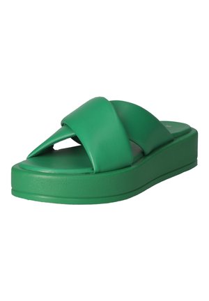 Grüne Plateau-Sandale mit breiten, überkreuzten Riemen und dicker Sohle, für den Freizeitgebrauch entworfen.