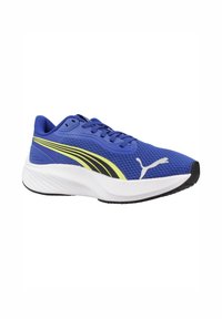 Zapatilla deportiva azul con parte superior de malla, acentos amarillos y negros, collar acolchado, sistema de cordones y una entresuela blanca. Suela exterior de goma negra.