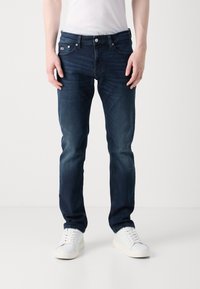 Tommy Jeans SCANTON SLIM - Slim fit jeans - denim dark