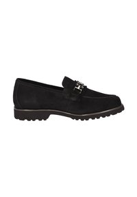 Mocassin en daim noir avec semelle épaisse et boucle décorative argentée sur le dessus, vue de côté sur fond blanc.