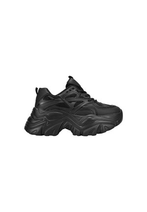 Zapatillas deportivas negras con una parte superior de malla texturizada, una suela de goma gruesa con curvas únicas y un collar acolchado para mayor soporte.