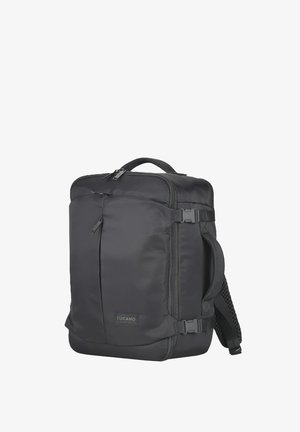 Zaino nero Tucano con più scomparti con zip, manici laterali, spallacci imbottiti e fibbie di compressione.