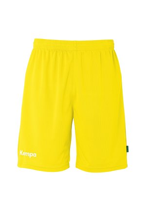 Helle gelbe Sportshorts mit elastischem Bund und weißem "Kempa"-Logo auf dem linken Bein.