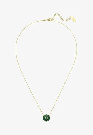 Collier doré avec une fine chaîne mettant en valeur un pendentif rond vert orné d'un motif d'étoile et d'un petit détail en pierre précieuse.