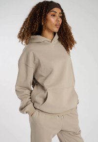 South Beach FLIGHT MODE BACK GRAPHIC  - Jersey con capucha - stone