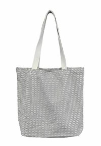 Melna un balta svītraina auduma soma ar divām gariem, platiem rokturiem. Tai ir vertikālas līnijas un plašs dizains bez aizdari.