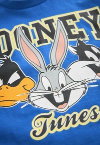 Next LOONEY TUNES SHORT SLEEVE REGULAR FIT - Nyomott mintás póló - blue
