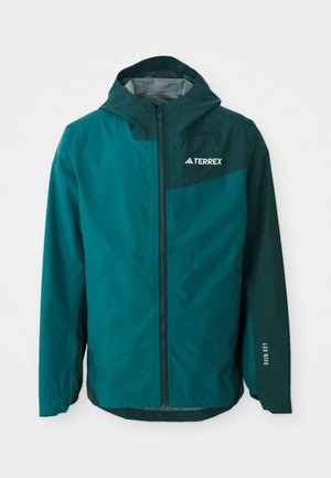 Teal vandtæt jakke med hætte, lynlås lukning, elastiske manchetter og "RAIN.RDY" trykt på ærmet. Fremstillet af letvægts, holdbart materiale.