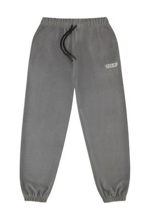 Graue Fleece-Jogginghosen mit elastischem Bund und schwarzem Kordelzug, mit gerippten Säumen und einem kleinen weißen Logo auf dem linken Oberschenkel.