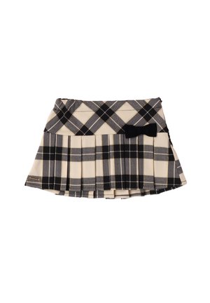 Falda de cuadros en negro y gris con pliegues, con un lazo negro como detalle en la cinturilla. La textura de la tela es suave; el diseño es de patrón.