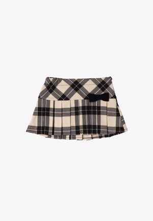 Jupe à carreaux noir et gris avec des plis, ornée d'un nœud noir sur la ceinture. La texture du tissu est lisse ; le motif est à carreaux.