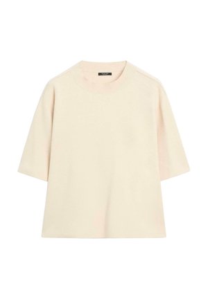 Lysebeige top med korte ærmer, rund ribstrikket halsudskæring og let oversized pasform. Fremstillet af blødt, glat stof med få detaljer.