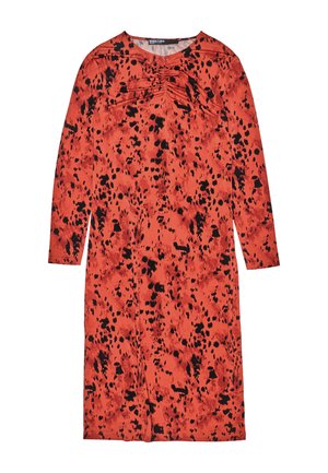 Red dress featuring long sleeves and a gathered detail at the neckline, adorned with a black splatter pattern throughout.