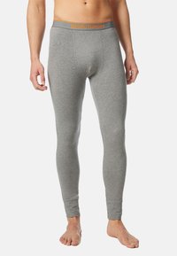 Grau Baumwoll-Unterwäsche mit einem enganliegenden Design, ausgestattet mit einem orangen Markenbund und nahtloser Verarbeitung für höchsten Komfort.