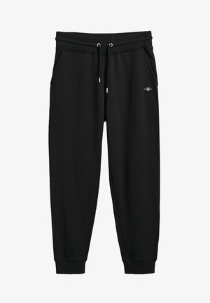 Schwarze Jogginghose aus weichem Material mit einem Kordelzugbund, Seitentaschen, gerippten Bündchen und einem kleinen Logo auf der Vorderseite.
