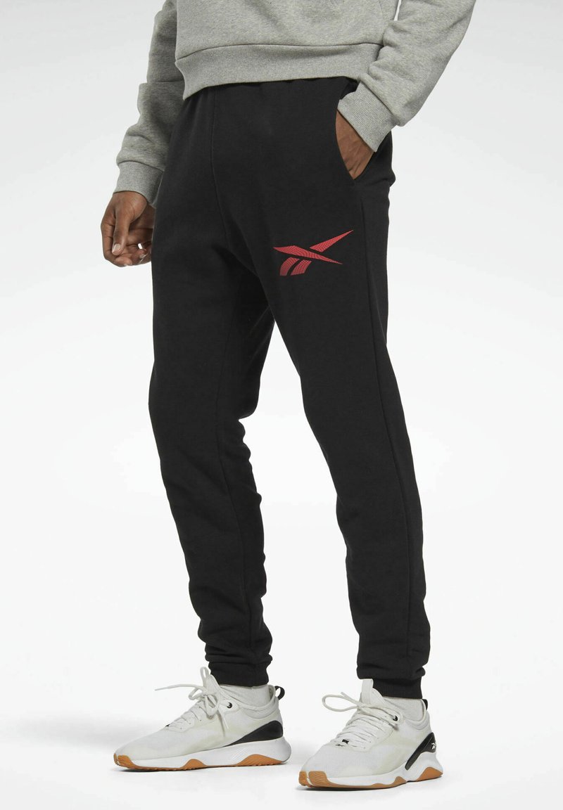 Reebok IDENTITY Tracksuit bottoms black Zalando.ie