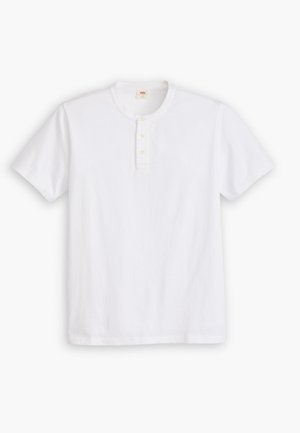 White short-sleeve henley shirt made of cotton, featuring a round neckline, three-button placket, and a subtle logo on the chest.
