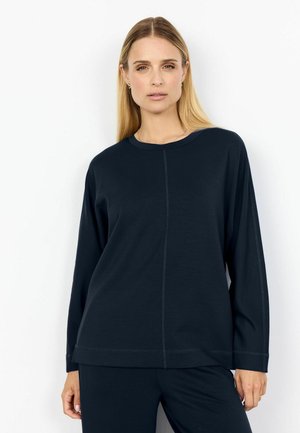 Maglione a maniche lunghe blu marinato realizzato in tessuto morbido, con scollatura rotonda e sottili dettagli cuciti sul davanti e sulle maniche.