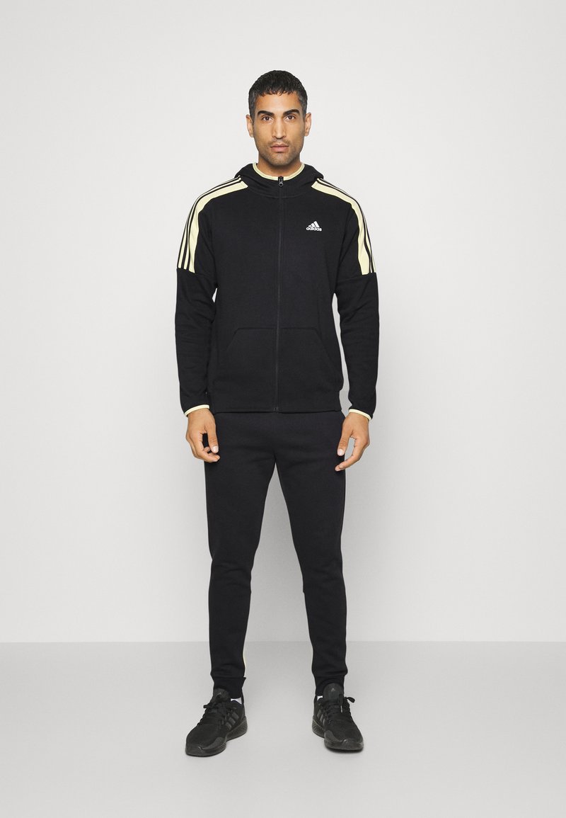 adidas Performance SET Tracksuit black Zalando