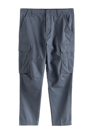 Next, Kapsáče - blue