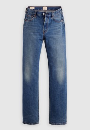 Blå denimjeans med lige ben, der har en falmet tekstur, orange syninger og fem-lomme-design med metalbeslag.