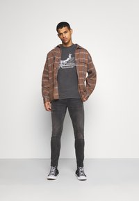 Levi's® 512® SLIM TAPER - Calças de ganga justas - snow fort warm