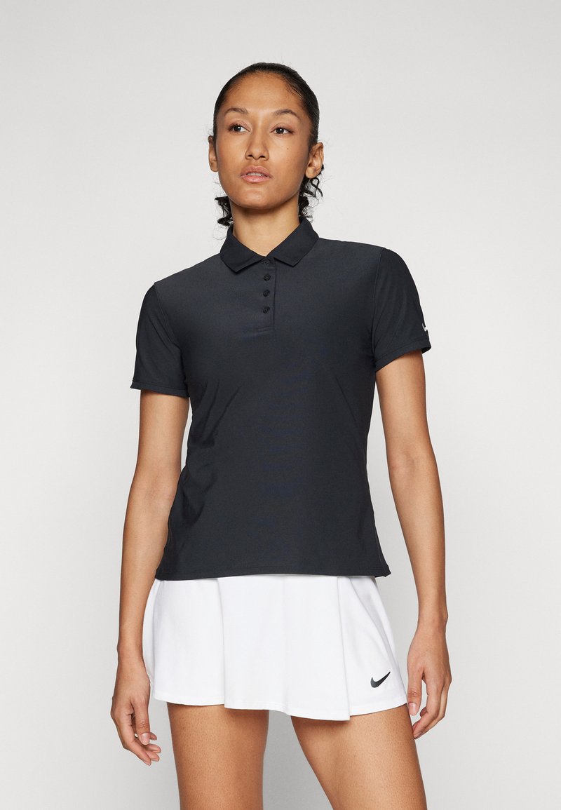 Black polo shirt with a classic collar, five button placket, short sleeves, and a lightweight, smooth texture. White logo accent on sleeve.